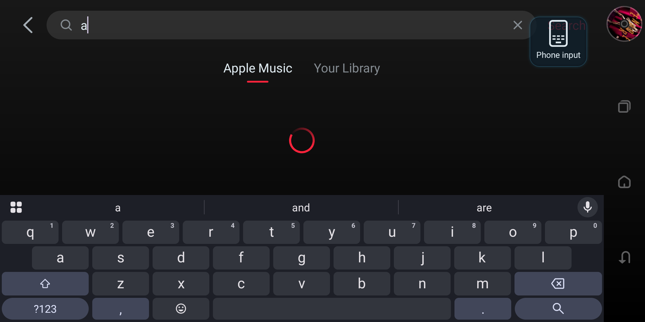 Apple Music search page with a typed query, loading indicator, and keyboard.